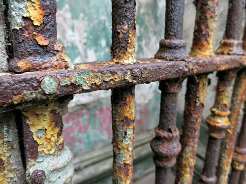 Rusty Weathered Metal Fence with Grunge Texture and Gothic Design - Industrial Urban Architecture Background