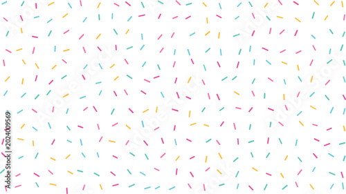 Foto A delightful white surface displays numerous small dashes of vibrant sprinkles s