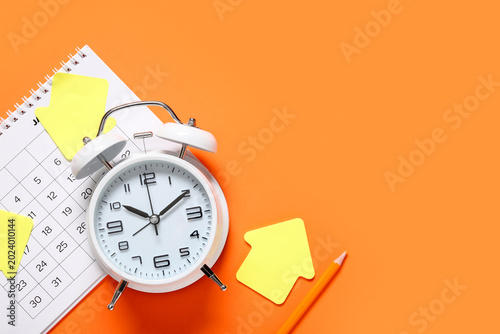 Alarm clock with calendar a...