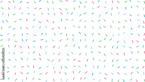 Konstfotografi A charming array of various colored sprinkles dispersed over a clean white canva