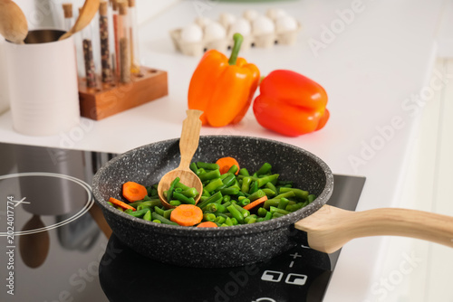 Frying pan with tasty veget...