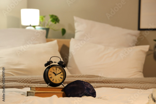 Alarm clock with books and ...