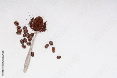 Spoon with coffee powder an...