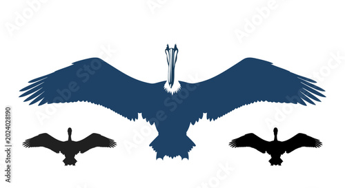 Canvas-taulu Silhouette of a majestic pelican with outstretched wings, flanked by smaller bir