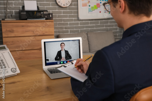Young businessman video cha...