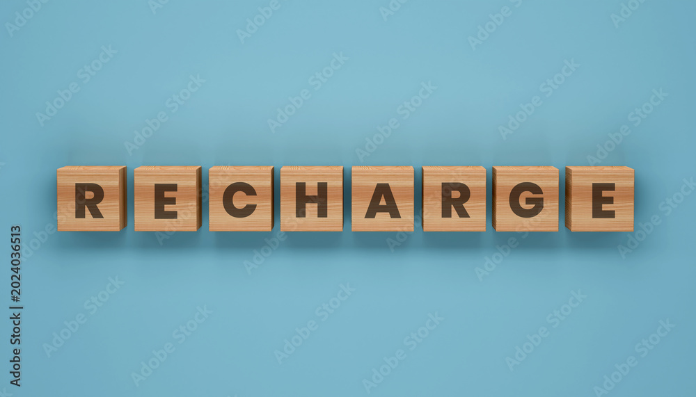 Naklejka premium Recharge Blocks on Blue Background