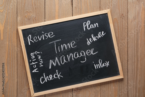 Blackboard with text TIME M...