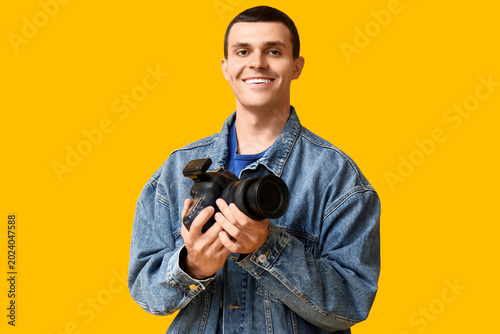 Male photographer with mode...