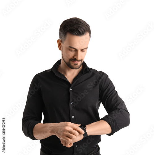 Handsome businessman lookin...