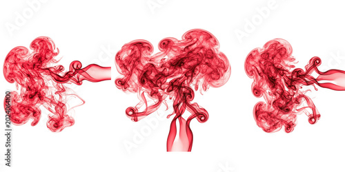 Tableau sur toile Vibrant red ink clouds swirling dramatically in water, energetic abstract smoke