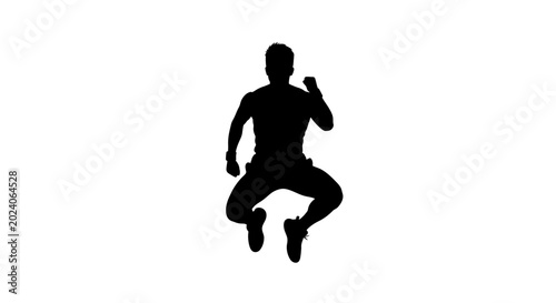 Photography Athlete silhouette captured mid-air during a dynamic jump demonstrates peak physical performance and energy