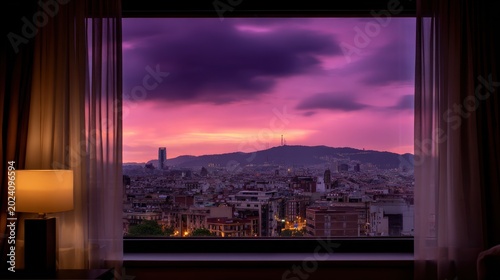 Window view of a city at dusk with a breathtaking purple and pink sunset sky