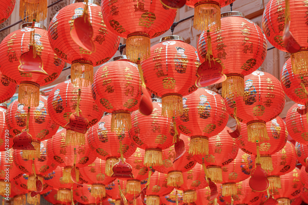 Fototapeta premium Ceiling from traditional Chinese red lanterns at Buddhist temple