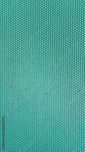 Closeup green mesh fabric texture suitable for backgrounds, design projects, textile patterns, fashion prints, and website backgrounds.