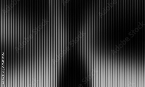 Foto abstract black and white background with a dense arrangement of repeating vertic