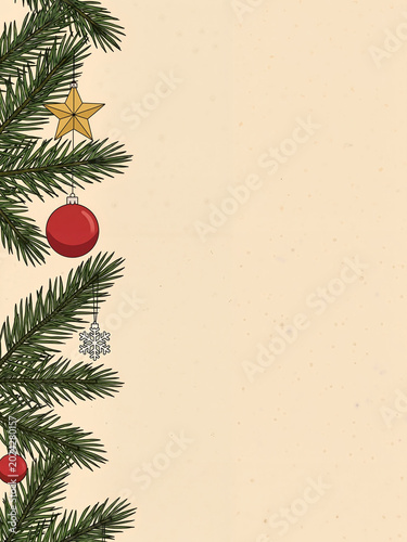 Christmas tree branch with ornaments on cream background  