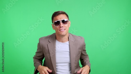 Smug arrogant man posing in slow motion