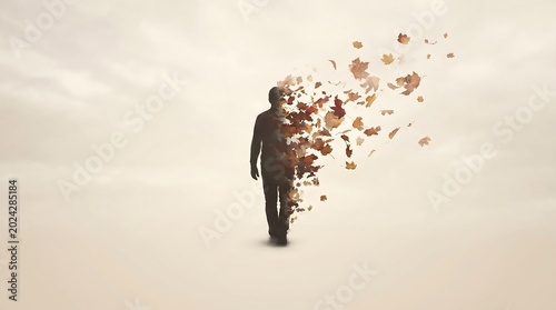 Silhouette of a Person Dissolving into Autumn Leaves Change Concept 