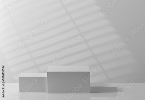 Minimal layered podium display with soft shadow lighting