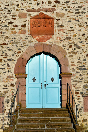 Eingangsportal der Schlosskirche Eisenbach bei Lauterbach, Hessen 