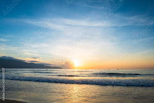 Bild auf Leinwand Sunrise at beach in Da Nang, Vietnam