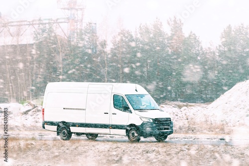 Delivery van on cold winter day road