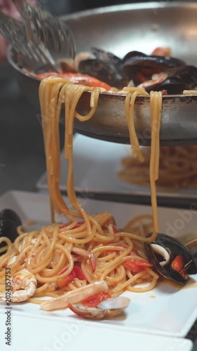 Hands preparing fresh Italian pasta dough with traditional ingredients at home kitchen