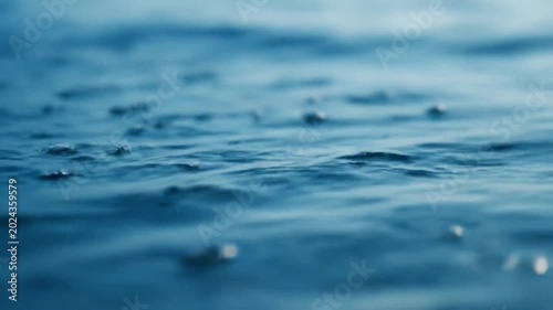 Calm ocean waves on a sunny day.