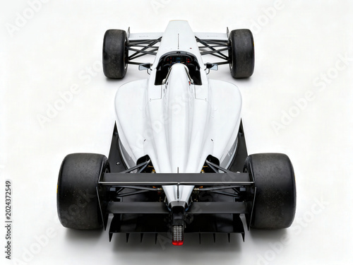 Top-down studio shot of a white formula race car, showcasing its aerodynamic design on white.