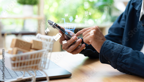 Tableau sur toile Young man using smartphone for online shopping, digital communication, mobile commerce, and modern technology concept