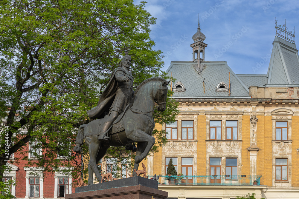 Fototapeta premium Equestrian monument to King Danylo Halytsky in Lviv Ukraine with historic architecture background