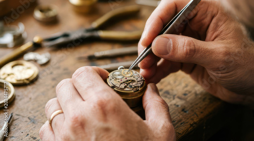 Crafting Time Closeup of Watchmaker Assembling Intricate Pocket Watch Mechanism.