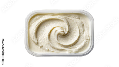Photos Isolated clear plastic container of creamy white spread, food product with elega