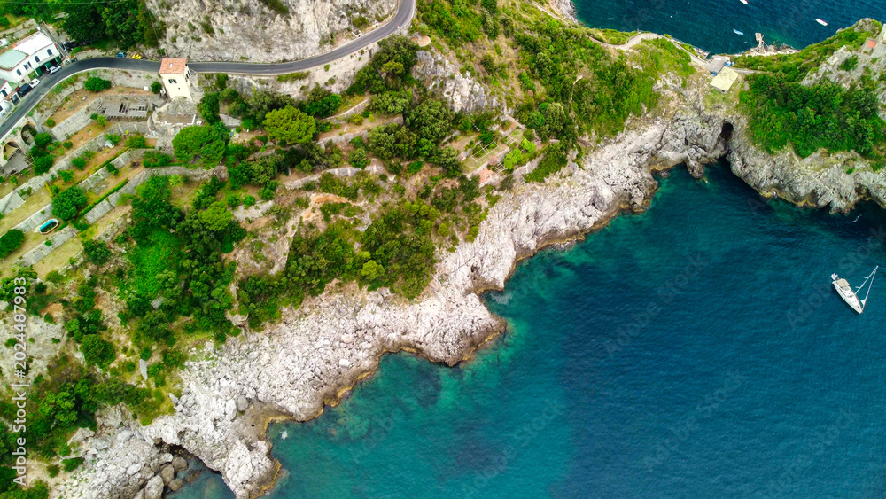 Fototapeta premium Aerial panorama of winding road and cliffs along Amalfi Coast Italy