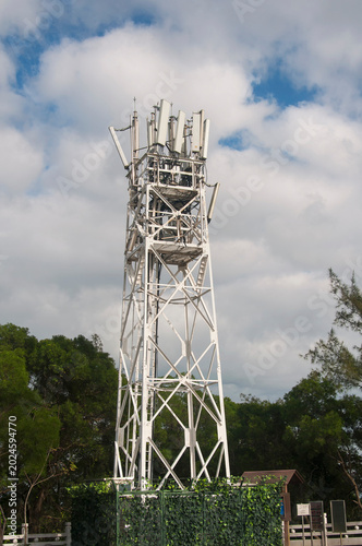 A communications tower macau china on a sunny day