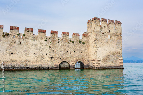 Tablou pe pânză Panoramic view of Scaliger Castle in Sirmione on the shore of Lake Garda with me
