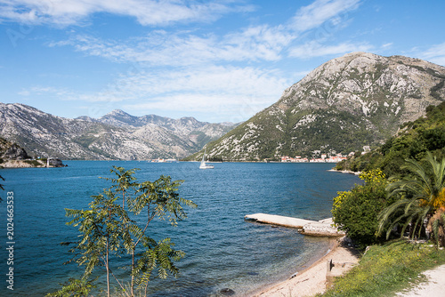 Landscape with sea and mountains. Beach in the Kotor Bay in Montenegro