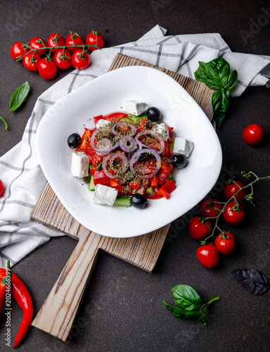 Greek salad, vegetable salad, salad with feta, tomatoes, cucumber, and olives