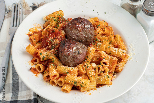 Obraz na płótnie rigatoni with two italian meat balls