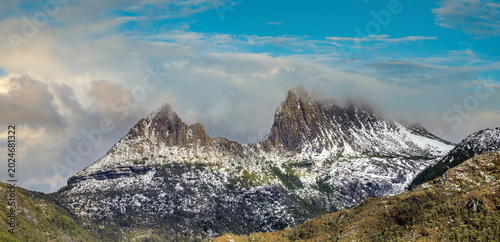 Scenic view of the iconic Cradle mountain and its adjacent summits with Dove Lake in the foreground, Central highlands of Tasmania, Australia