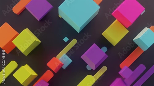Overhead view of colorful 3D blocks and shapes arranged diagonally on a dark background with a modern aesthetic.