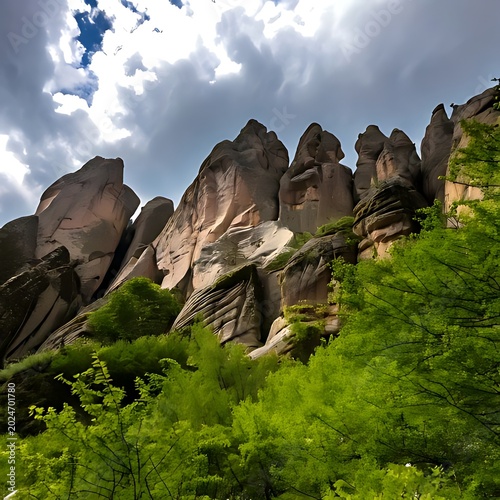 Dramatic rock formations meet vibrant green foliage