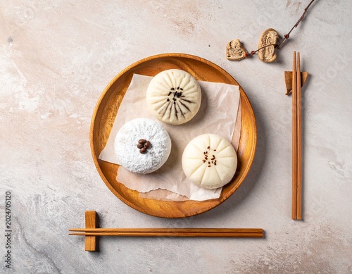 Traditional Japanese sweets on washi paper, flat lay top view, no people