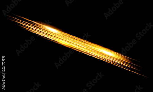 Fotografie Dynamic golden light trails and motion blur streaks diagonal on black backdrop