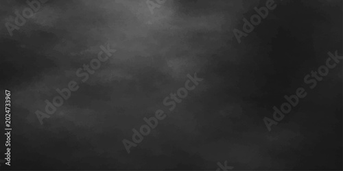 Fotografie A dark grunge black paper background with an old vintage texture and subtle grey
