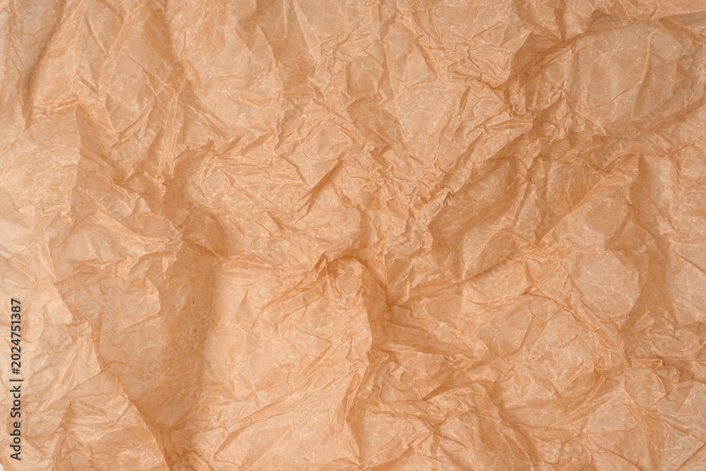 Fototapeta premium Crumpled paper as background. Top view.