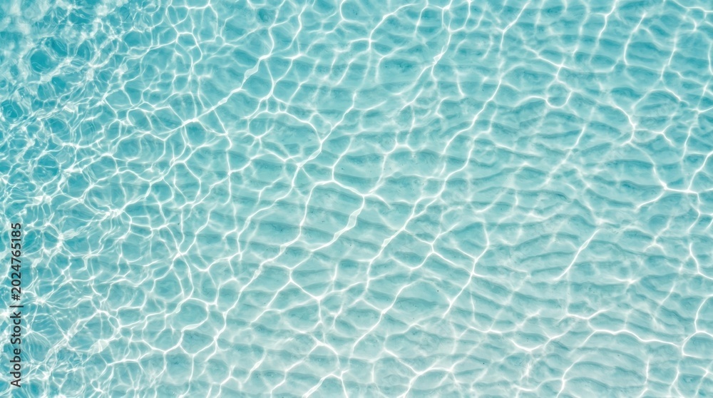Fototapeta premium Tranquil Blue Water Shimmering with Sunlight