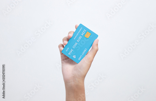 hand holding credit card