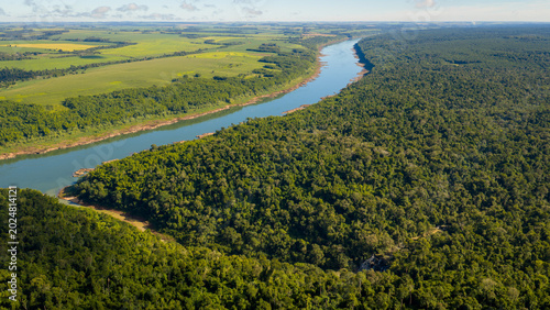 Aerial View of Paraná River Border Showing Landscape Contrast Between Argentina and Paraguay