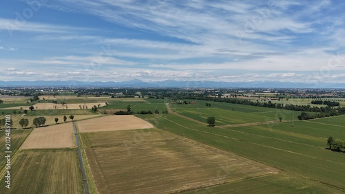 Fotografi Italian Countryside Panorama: An expansive aerial view showcases the patchwork of agricultural fields